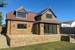 REHAU-RIO-Bricket-Wood-black-The-Uplands-rear-elevation