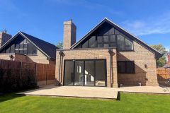 REHAU-RIO-Bricket-Wood-bungalow-black-casements-4-panel-bifold