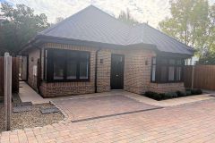 REHAU-RIO-Bricket-Wood-bungalow-black-casements-EDC-front-dr-1