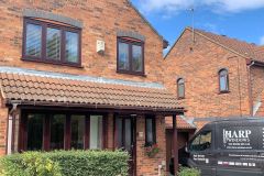 REHAU-RIO-rosewood-front-van